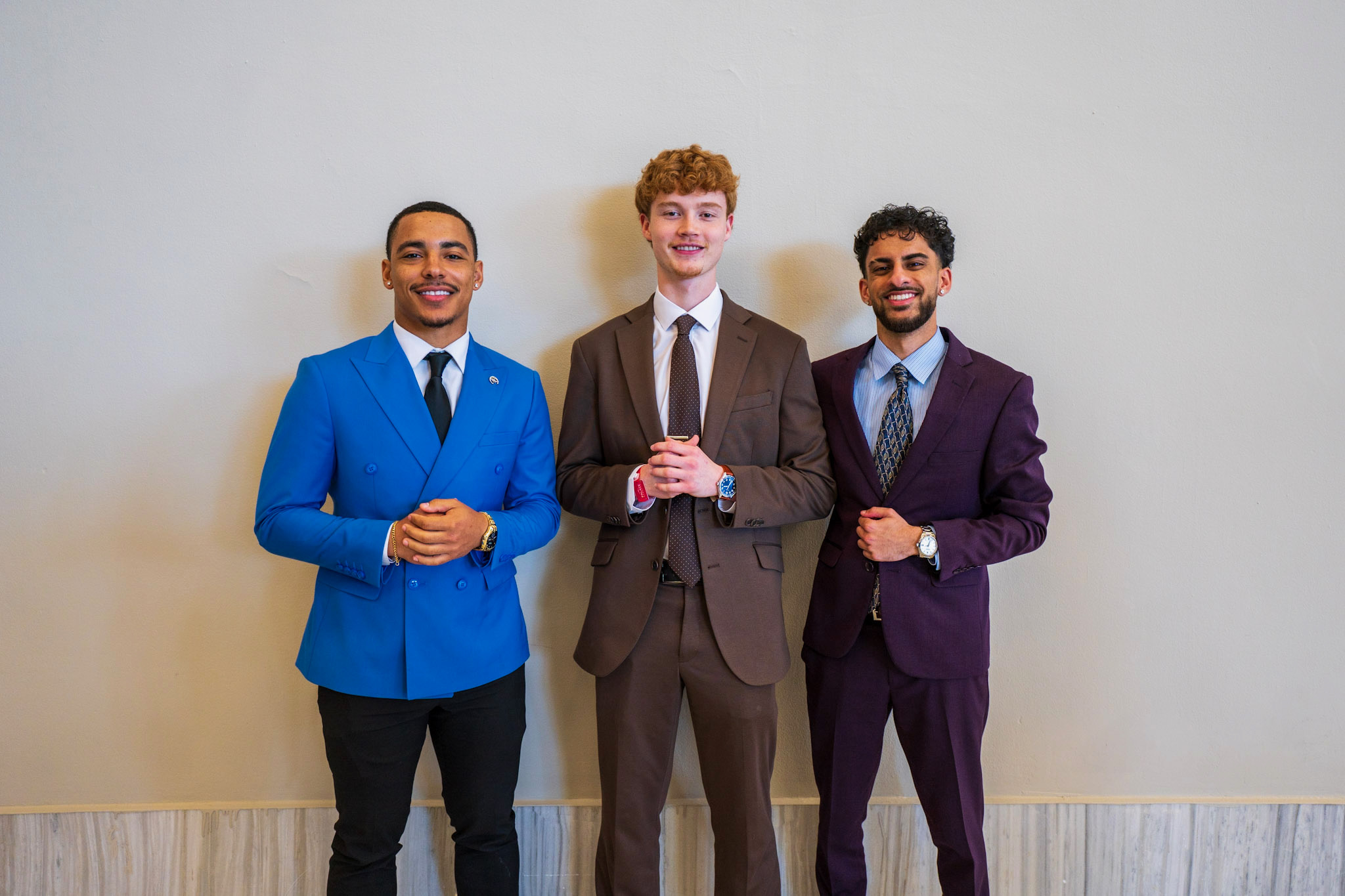 NorthCrest Capital team leaders in professional attire at an event